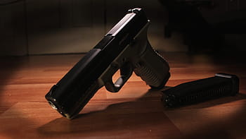 pistol on floor, Glock, Pistol, Handgun, Weapon, gun, firearm, black color, shoe, indoors, close-up