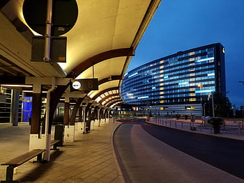 structure sidewalk photo, nighttime, Stockholm, Sweden, Airport, Bus, Bus Terminal, airport, bus stop, travel, taxi stop, hotel shuttle pickup