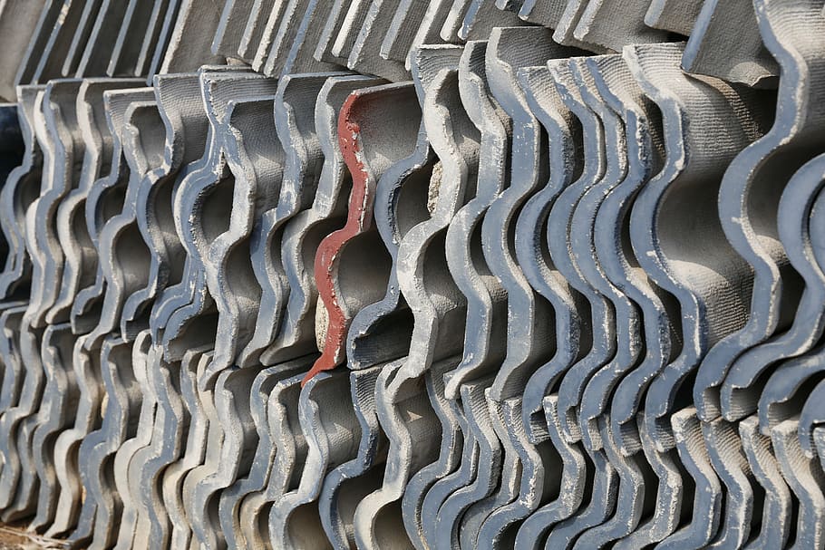 tile, brick, roofing tiles, construction materials, building supplies, ceramic tiles, architectural elements, outdoor tiles, durable tiles, red accent, stacked tiles