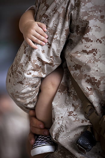 close, photograph, man, military, jacket, holding, baby, dad, son, carry, marine