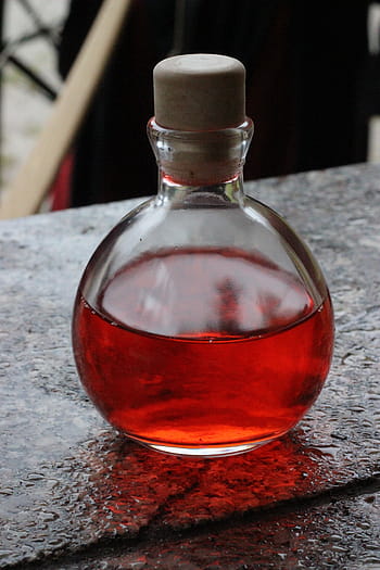 close-up photo, clear, glass bottle, red, liquid, potion, bottle, magic potion, vial, glass, cork