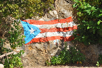 cuba paint flag, rock, puerto rico, mountain, rock wall, flag, shrubs