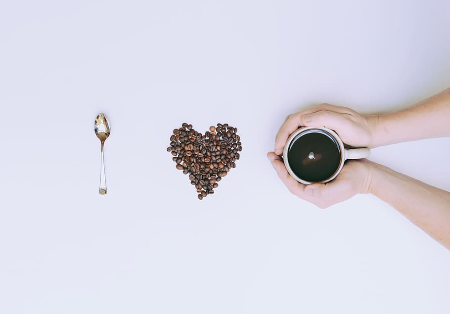 person, holding, ceramic, mug, coffee, beans, spoon, cup, still life, hands, warm