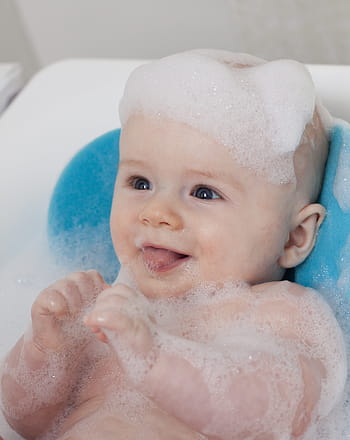 closeup, photography, bathing baby, plastic bather, child, baby, bathing, cheerful, happy, portrait, childhood