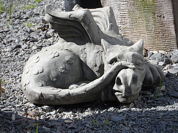 gray dragon statue, sculpture, dragon, stone, horticulture, outside art, artwork, plastic, subject, art object, landscape