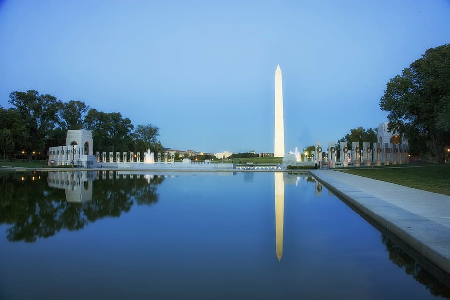 white obelisk, washington dc, sunset, dusk, evening, reflecting pool, water, reflections, washington monument, world war ii memorial, trees