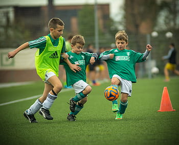 boy, playing, soccer, daytime, child, footballer, shot, use, football, team, fight